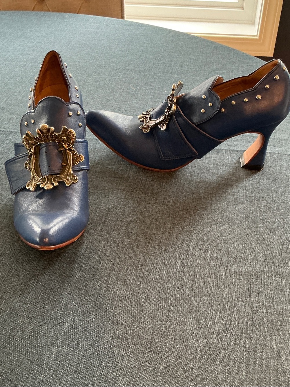 John Fluevog Navy Leather Heeled Loafers with Ornate Gold Buckles